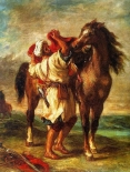 Arabe sellant son cheval